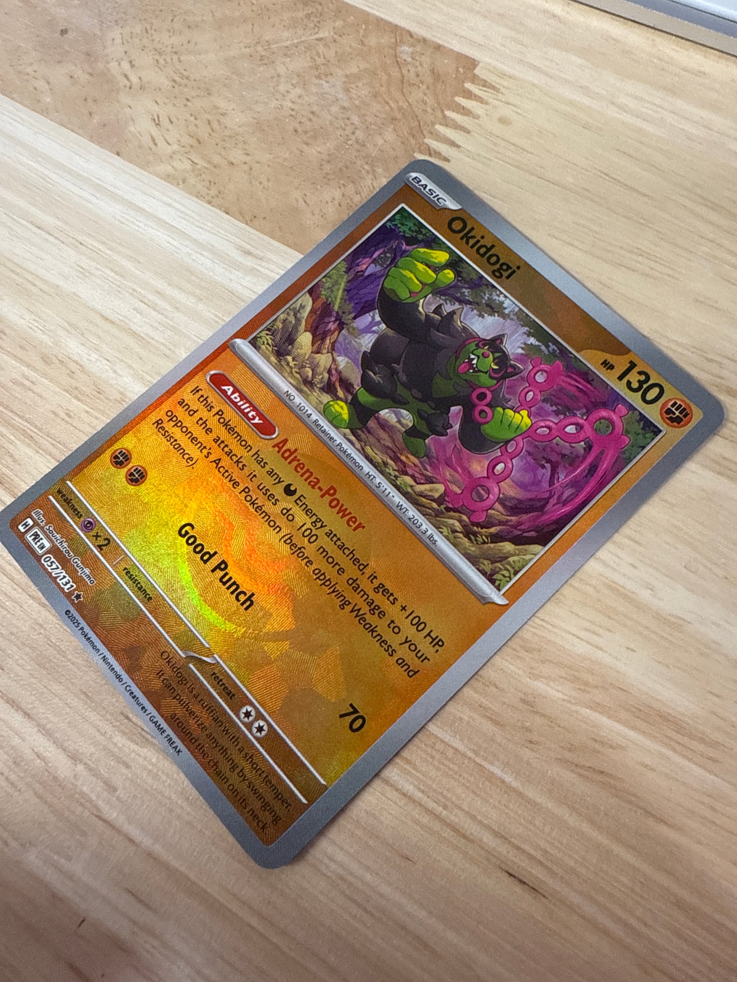 Okidogi 57/131 Pokeball Holo | Prismatic Evolutions | Pokemon Card