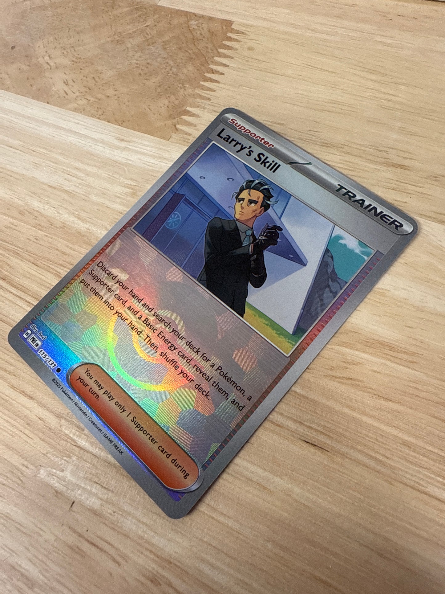 Larry's Skill 115/131 Pokeball Holo | Prismatic Evolutions | Pokemon Card
